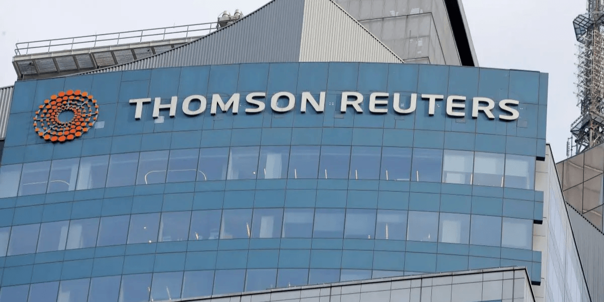 Signage of Thomson Reuters on a modern glass building exterior