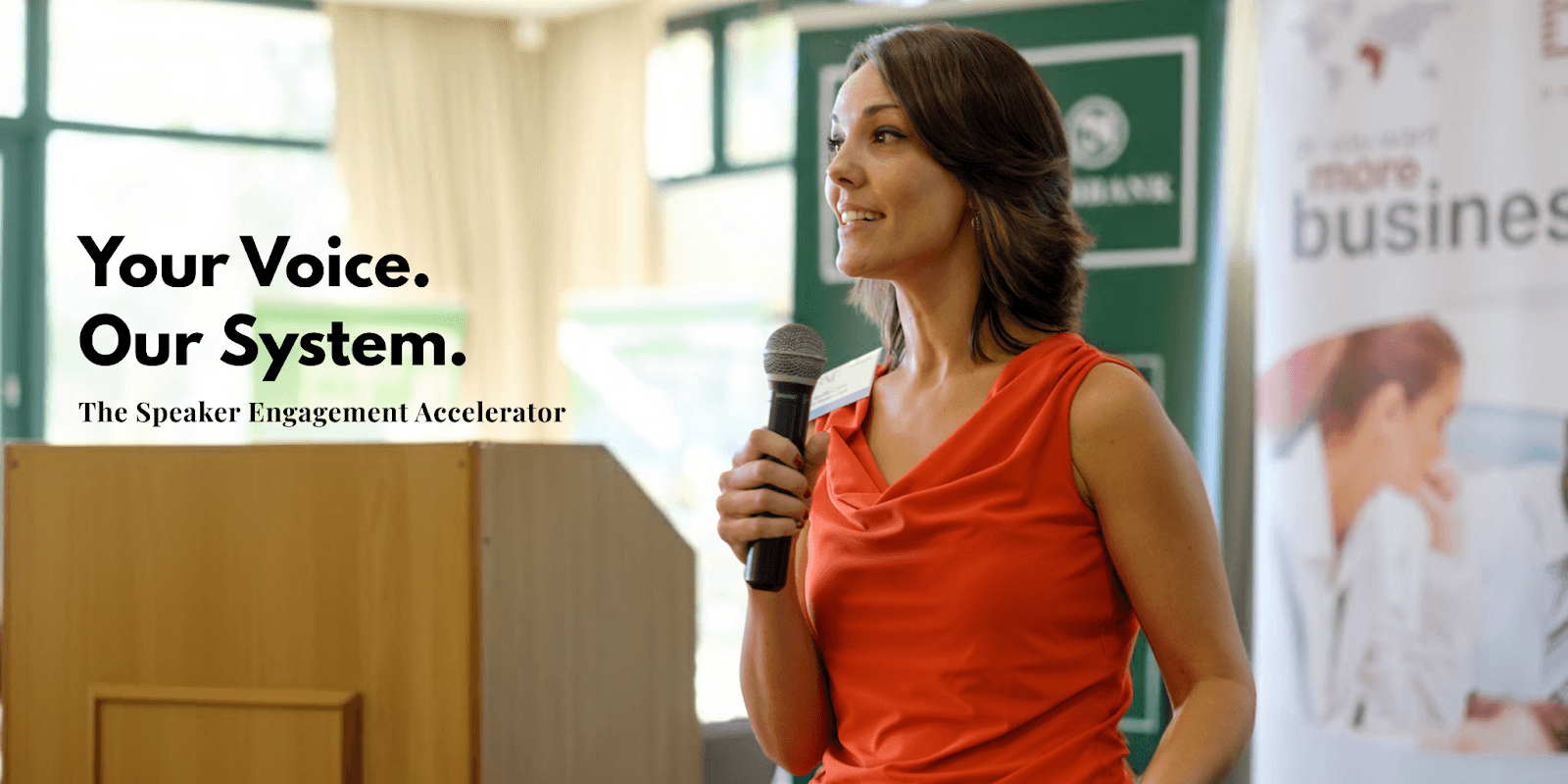 Claudia Lowry speaking at an event, promoting the Speaker Engagement Accelerator system for entrepreneurs to build authority.