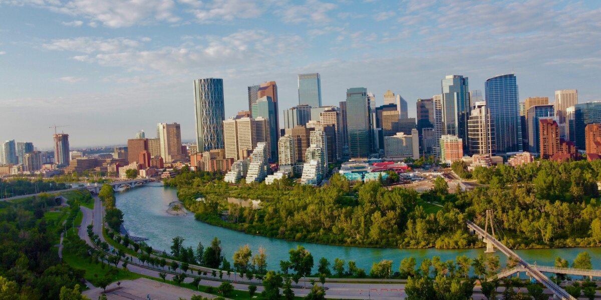 Calgary skyline with river and downtown buildings representing Canadian business and digital transformation.