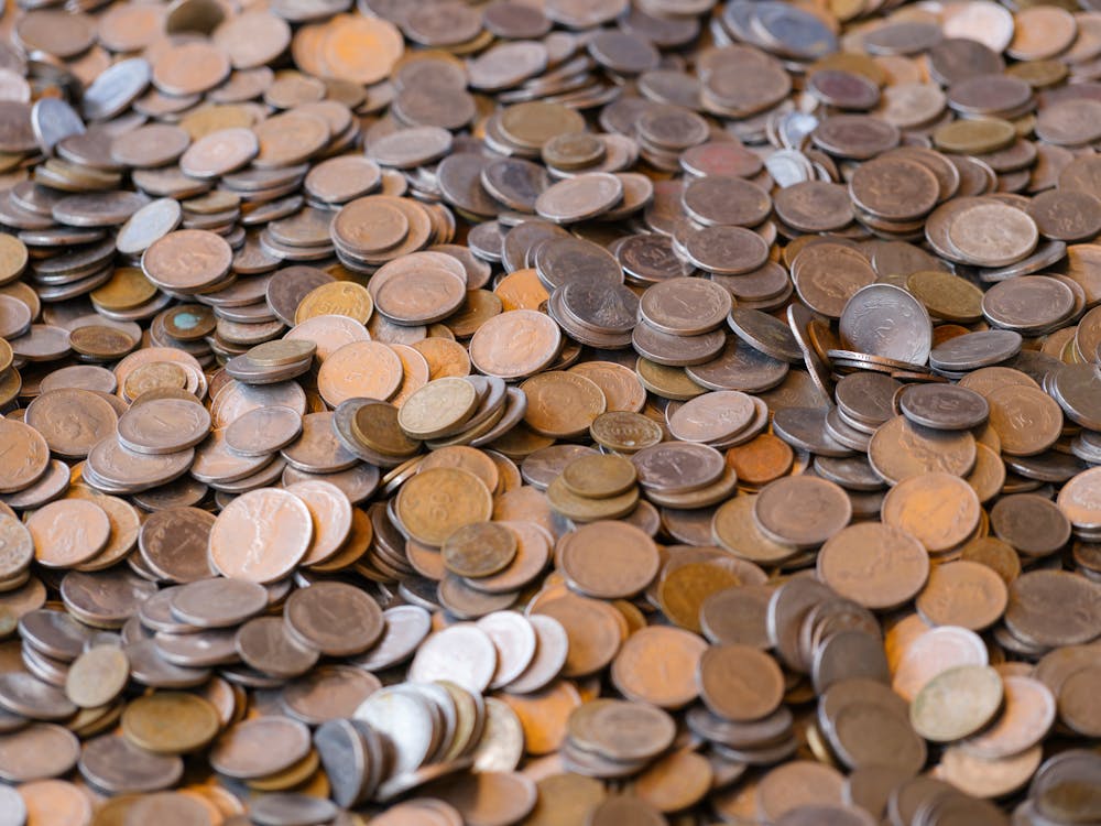 Free Photo Of Abundance Of Coins Depicting Wealth And Finance