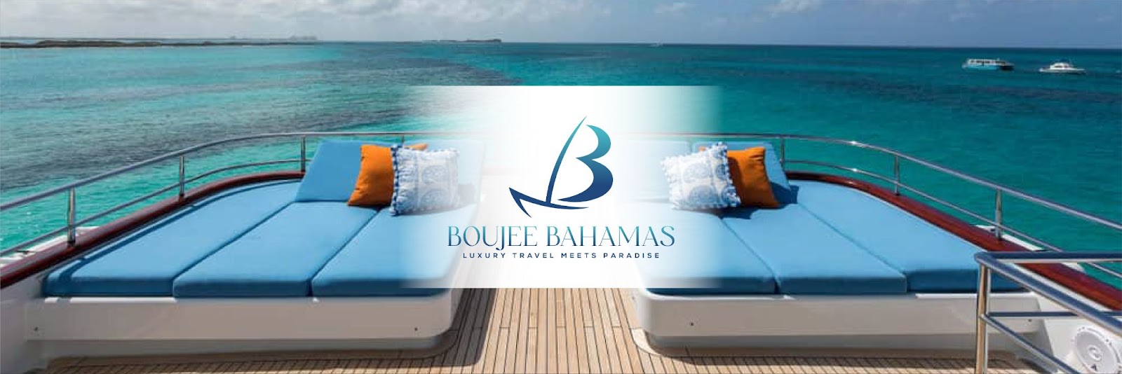 Luxury boat seating on a pristine beach with turquoise waters in the background, featuring cushions in blue and orange. The Boujee Bahamas logo and tagline 'Luxury Travel Meets Paradise' are displayed prominently.
