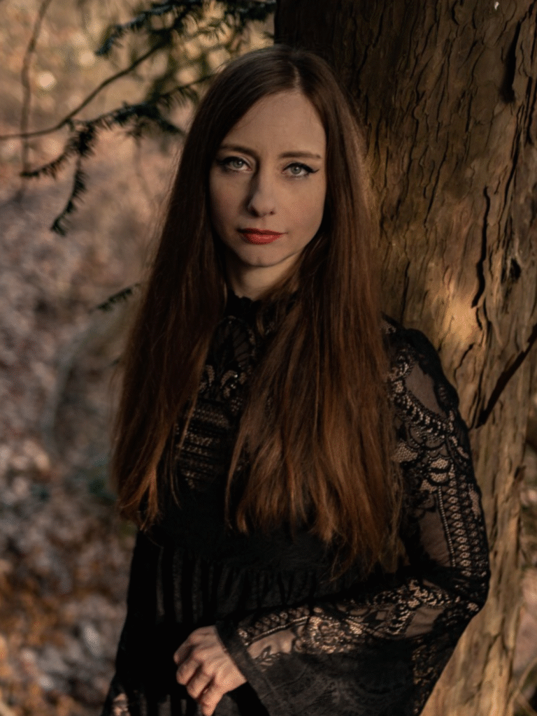 Zela Feraco, women’s empowerment coach and founder of Nightshade Sanctum, empowers entrepreneurs with a blend of science, spirituality, and sustainable leadership.