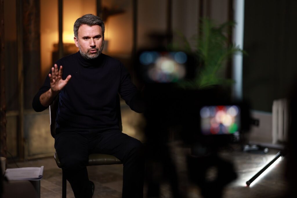 Leader displaying confidence and thoughtfulness, emphasizing trust as a key asset in leadership for 2026.