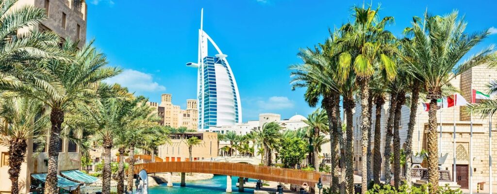 (Dubai city with Burj Al Arab): Dubai’s iconic skyline, offering endless business opportunities and luxury living with Thrust Management’s services.
