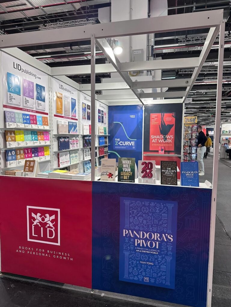 LID Publishing booth featuring Ivan Yong's book Pandora’s Pivot at a business event.