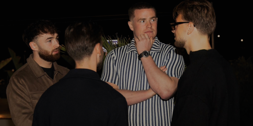 "Business professionals engaging in discussion, reflecting the collaborative community of Monopoly Markets."