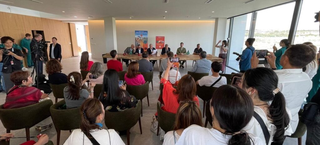 Press conference where researchers present findings on fermented pomegranate as a natural longevity ingredient.