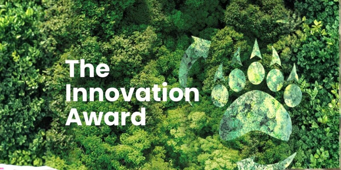 green forest background with a large paw print design, symbolizing innovation and sustainability.