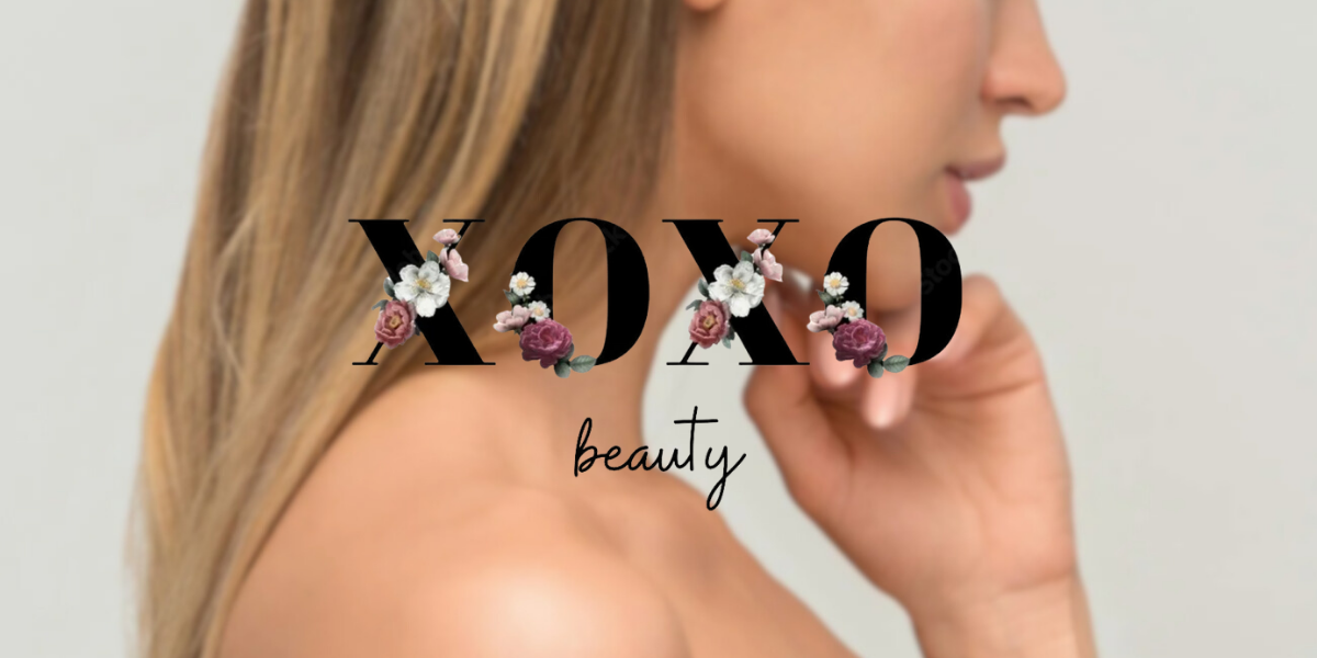 Elegant image of woman with the XOXO Beauty logo and floral design.