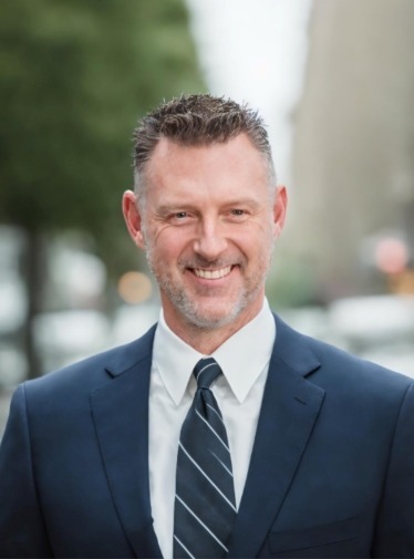 Photo of Cameron Oxberry: Professional portrait of Cameron Oxberry, a financial expert specializing in divorce-related mortgage planning.