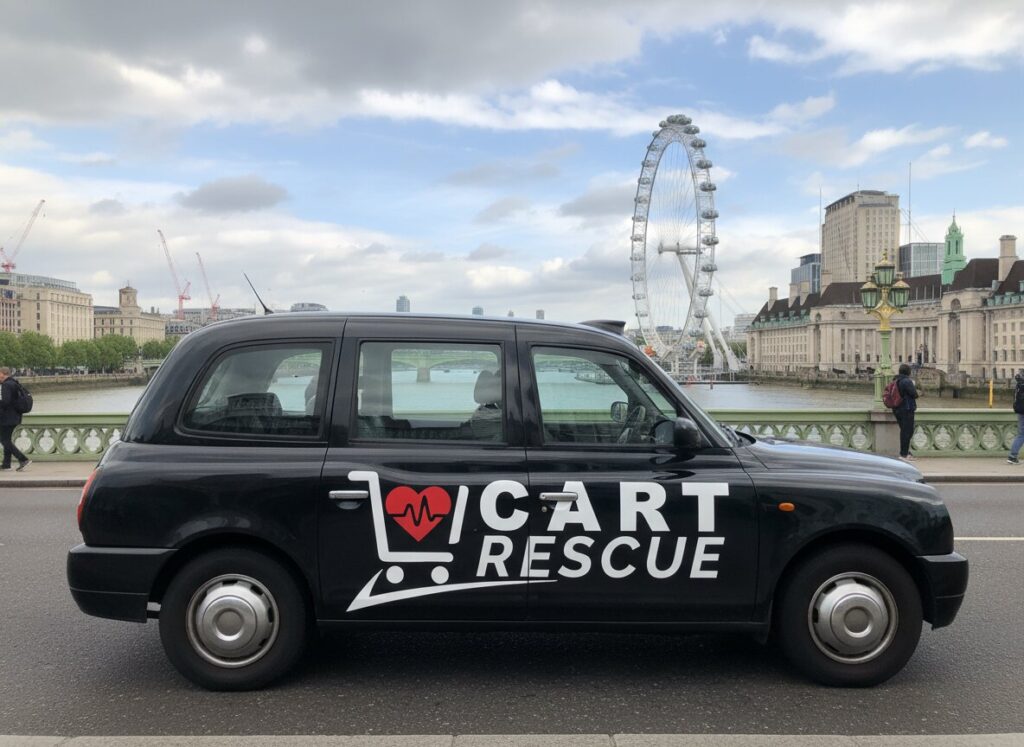A black taxi with "Car Rescue" written on it, symbolizing assistance for hesitant shoppers at checkout.