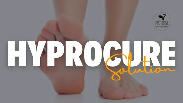 Close-up of bare feet with large “HYPROCURE Solution” text and clinic branding.