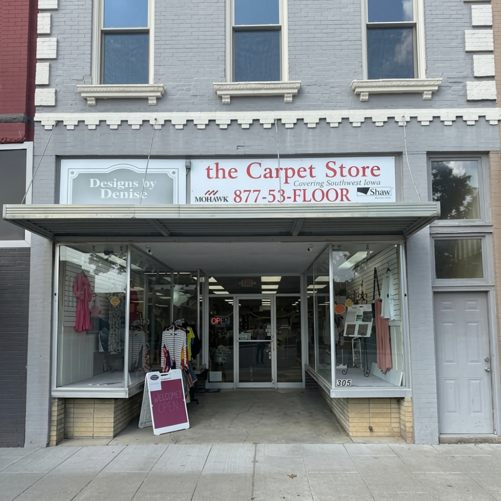 Exterior storefront of The Carpet Store in Red Oak, Iowa, serving southwest Iowa flooring customers.