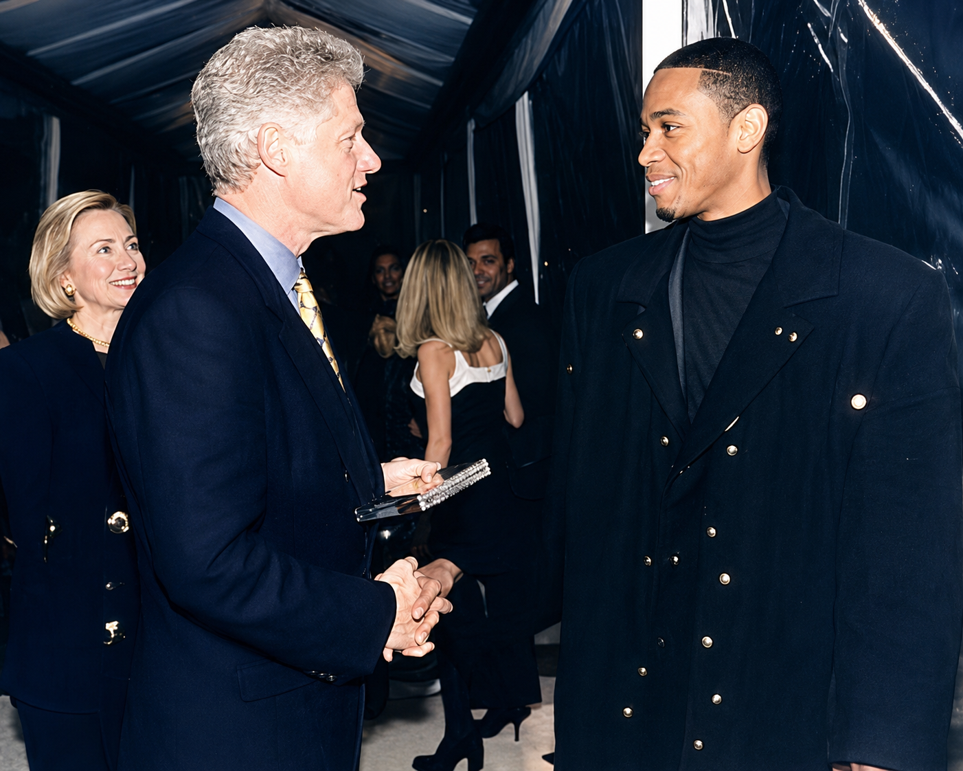 Young man speaking with former president at a formal event.