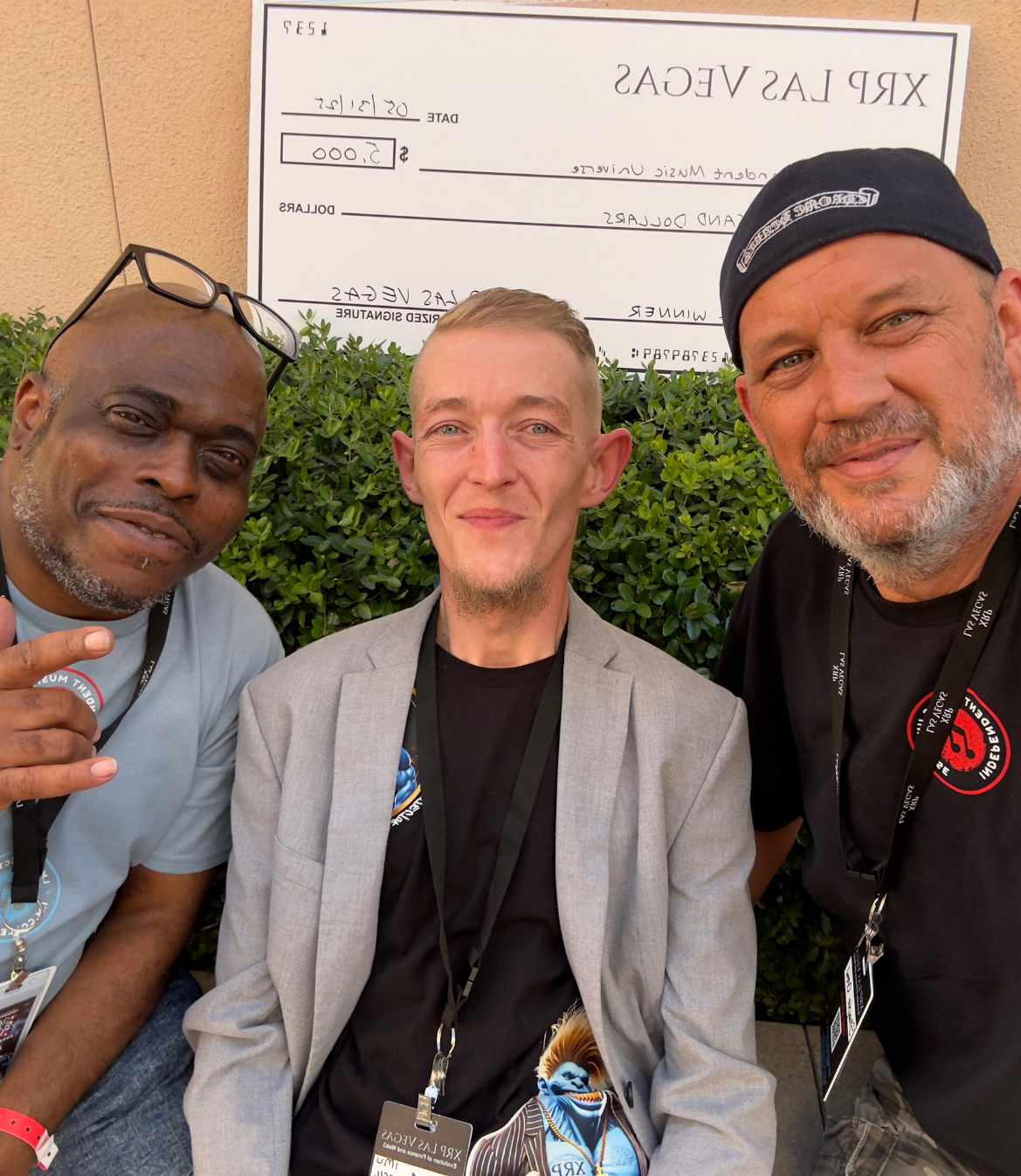 IMU founders pose together during the XRP Las Vegas event after their Shark Tank competition win.
