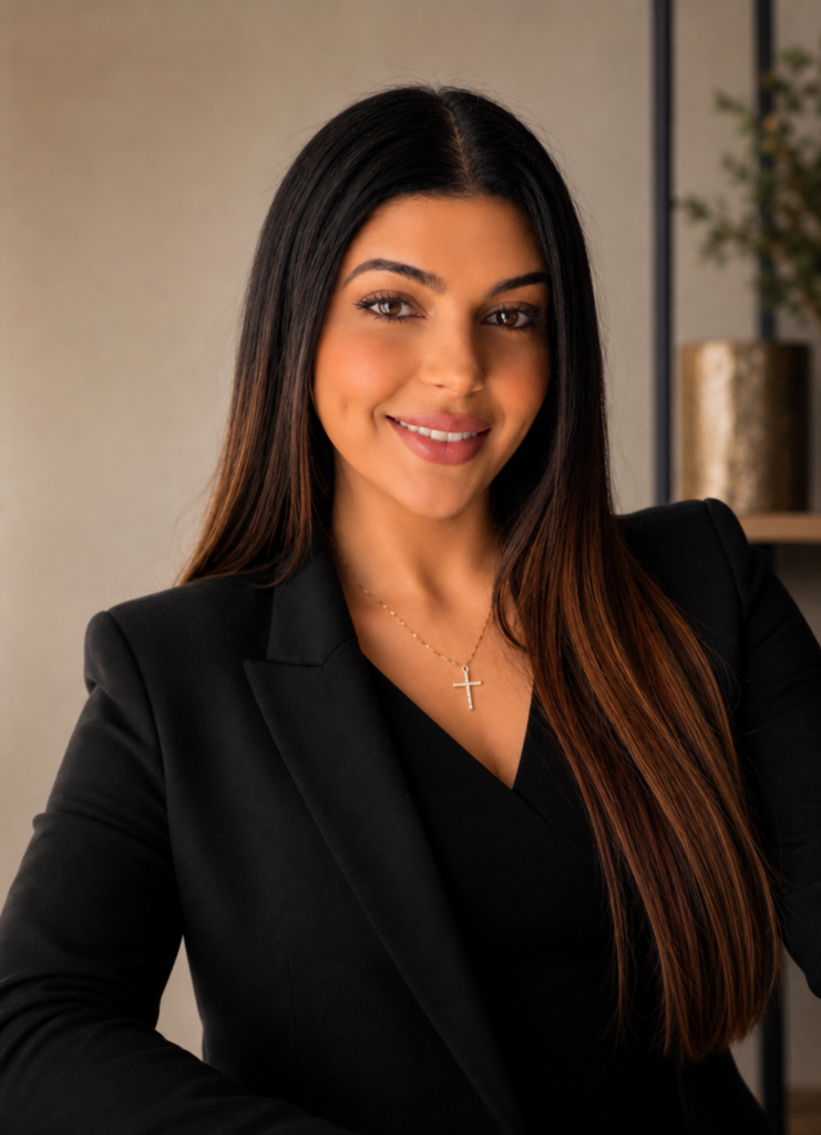 Portrait of Rana Rofail Chahine in a black blazer at the Wealthy Matters office.