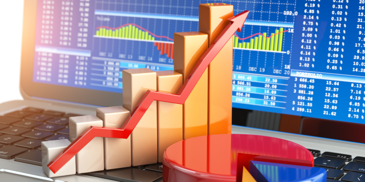 Rising financial chart and arrow displayed against stock market data on a laptop screen.